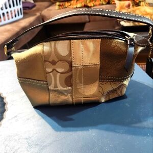 New coach signature jacquard leather patchwork mini handbag gold bronze.